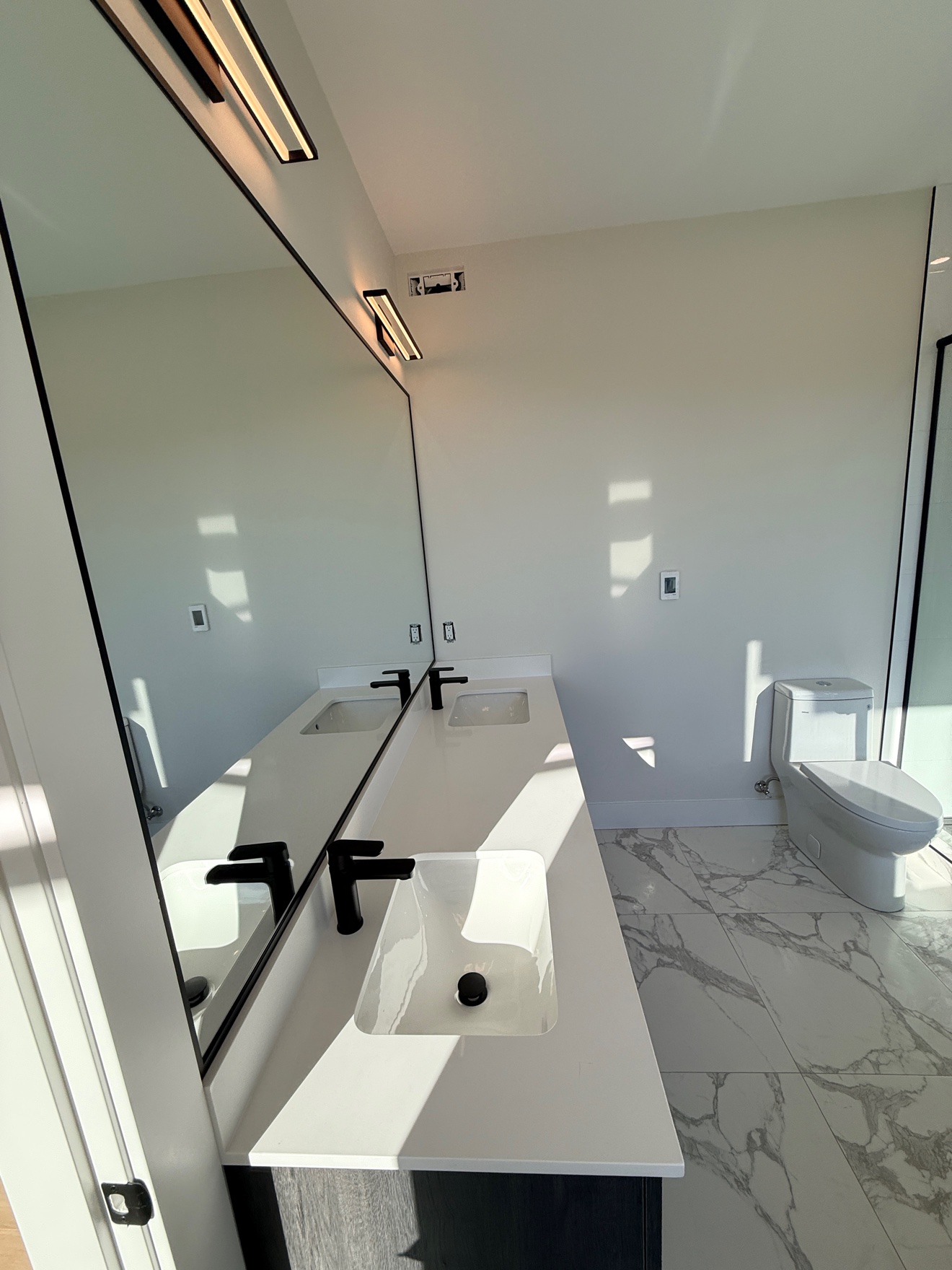 Bathroom with marble floor after a clean